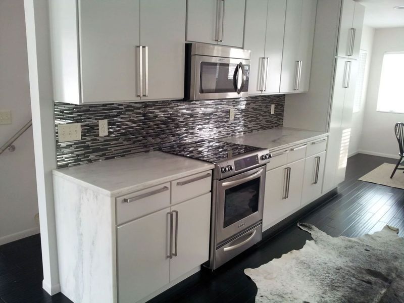 A kitchen with counter tops