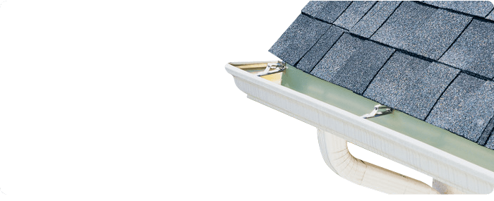 Roof with a white seamless gutter