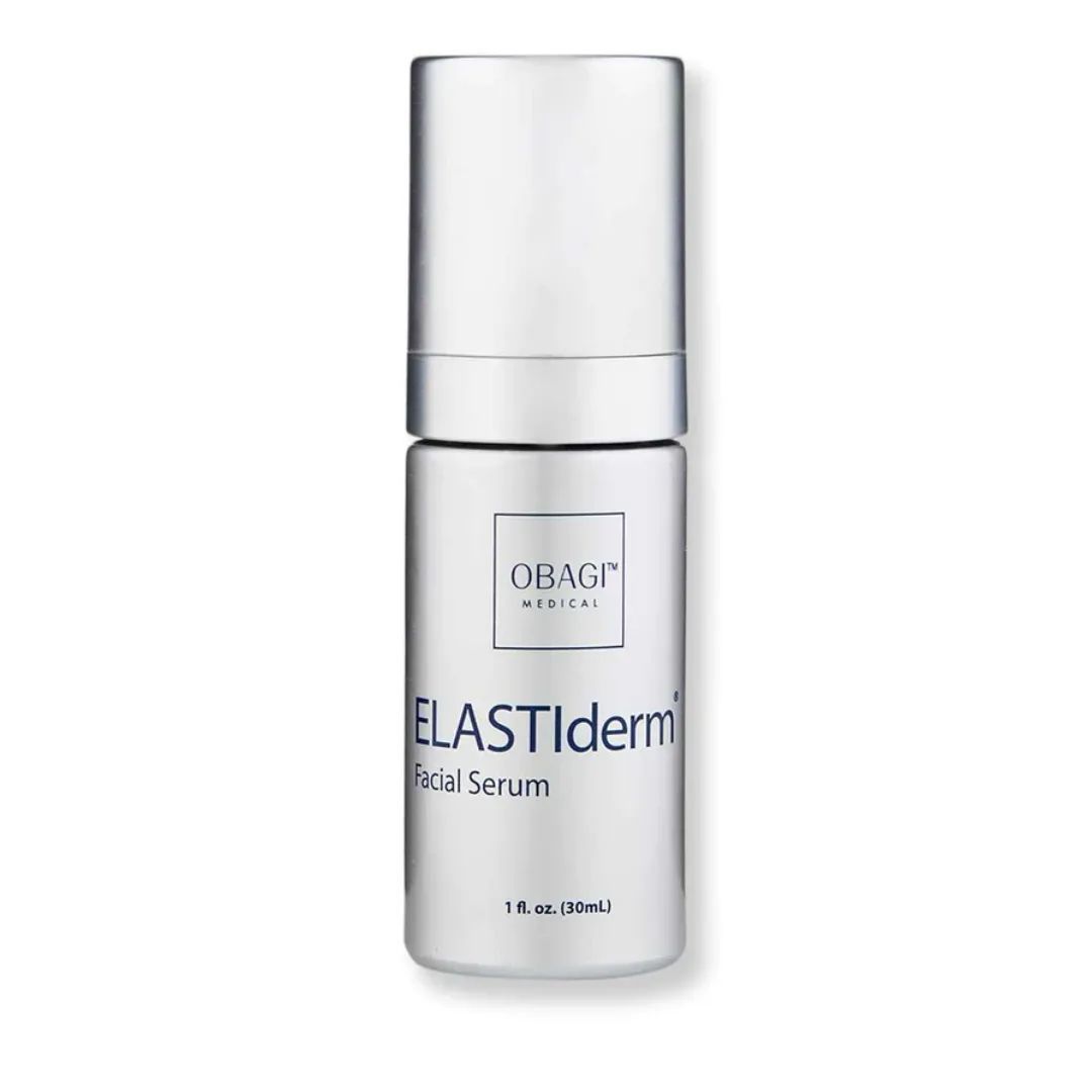 A bottle of obagi elastiderm facial serum on a white background