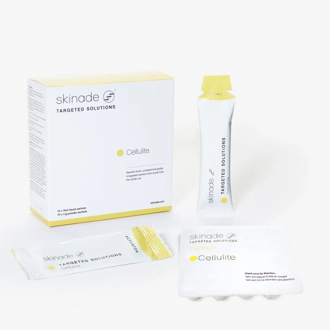 A white box with a yellow bottle next to it.