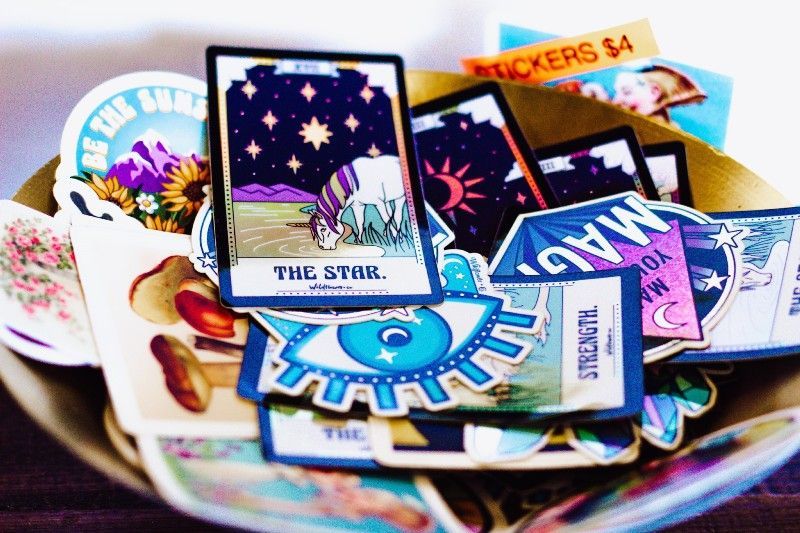 A pile of stickers including one that says the star