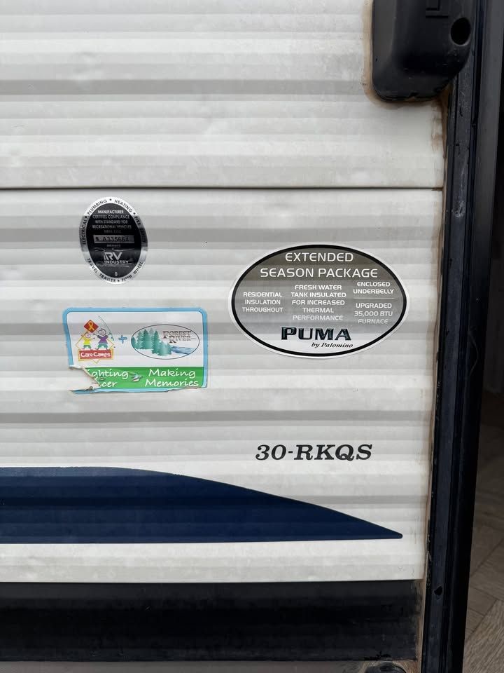 RV exterior with stickers: 