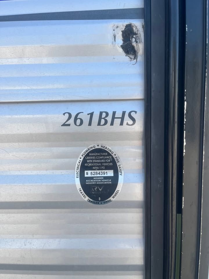 Silver RV siding with 