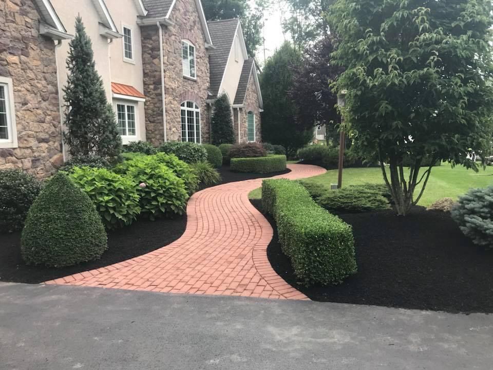 brick patio with a beautiful landscape