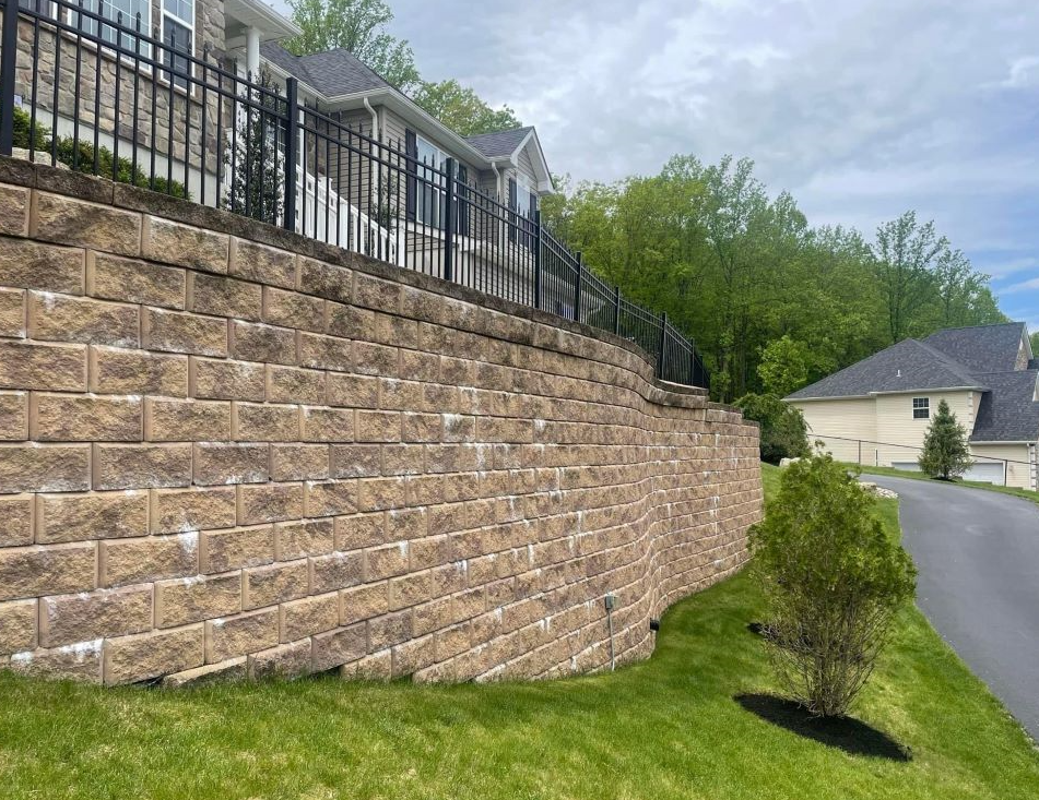 retaining wall with metal fence