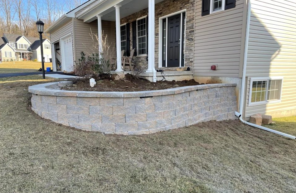 front of a house with dried grass