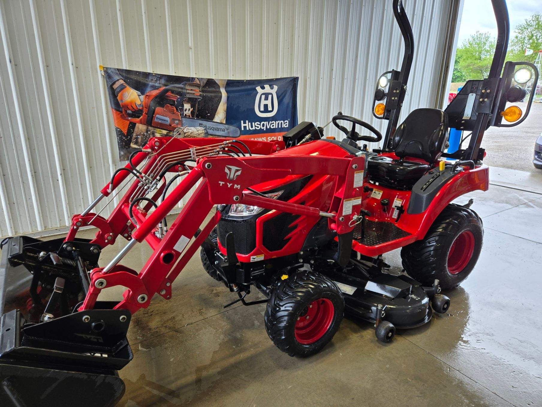 Used T224 Tractor, loader, belly mower