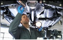 Man checking Exhaust