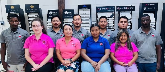 A group of people are posing for a picture together.