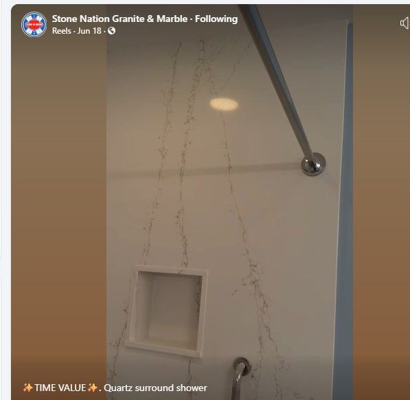 A picture of a bathroom with the words stone nation granite & marble following.