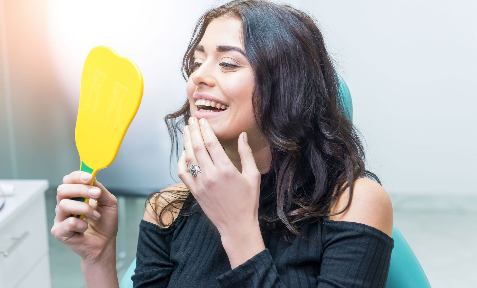 lady looking herself in the mirror