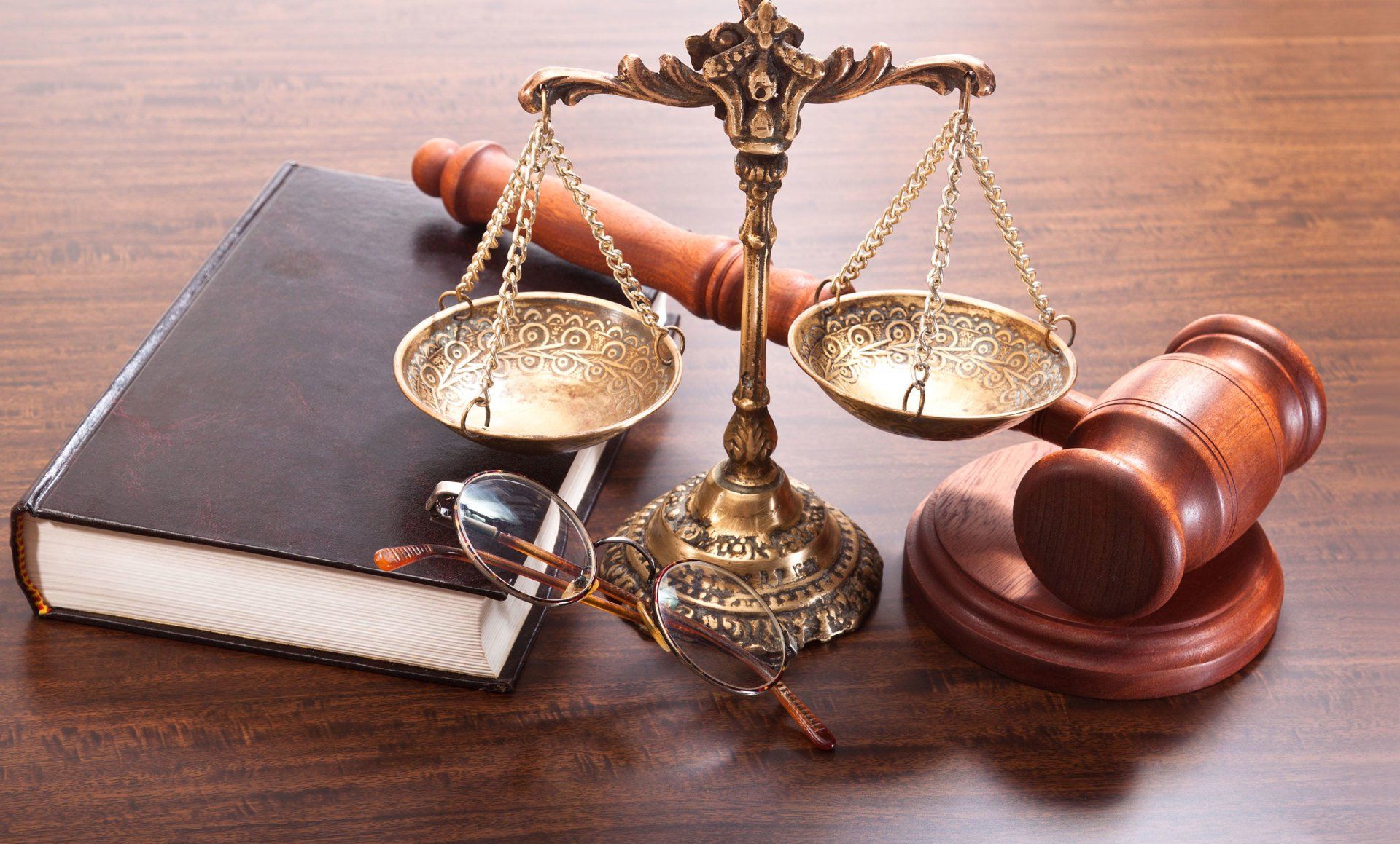 Learn More About General Law Scale of justice and gavel