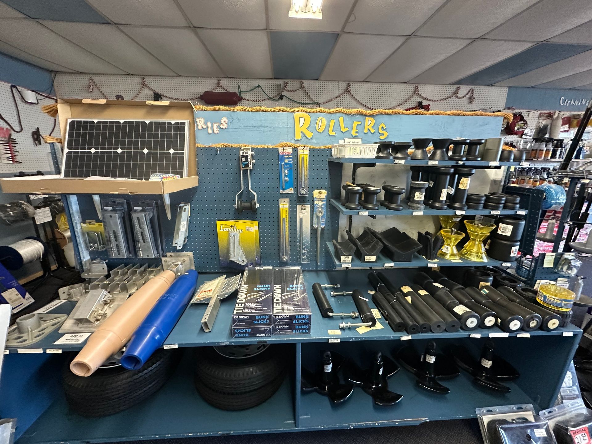 A store with a sign that says rollers on it