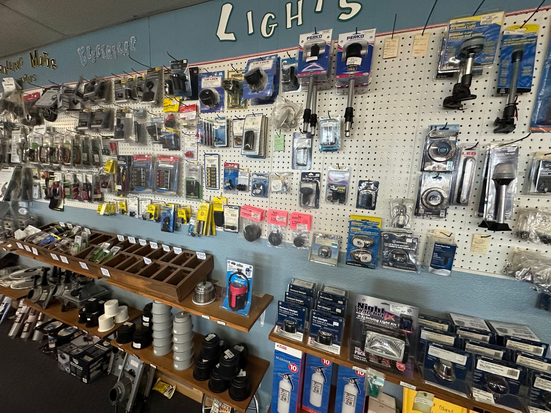 A wall filled with lots of different types of tools and accessories.