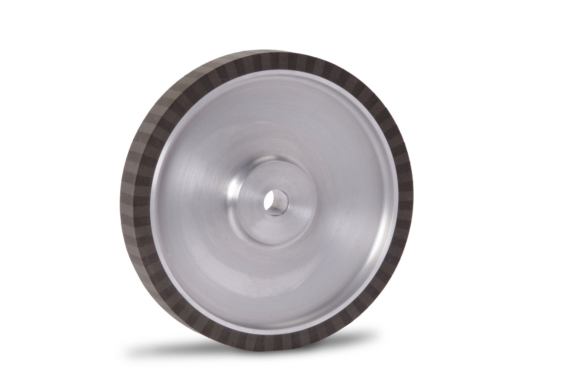 A close up of a metal wheel on a white background