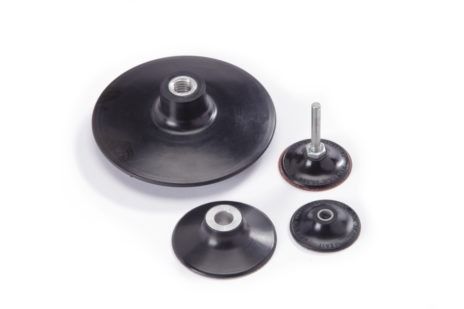 A group of black rubber pads with a screw in the middle on a white background.