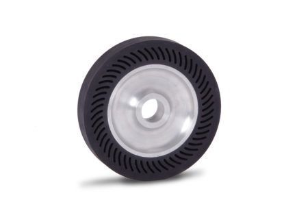 A close up of a wheel on a white background.