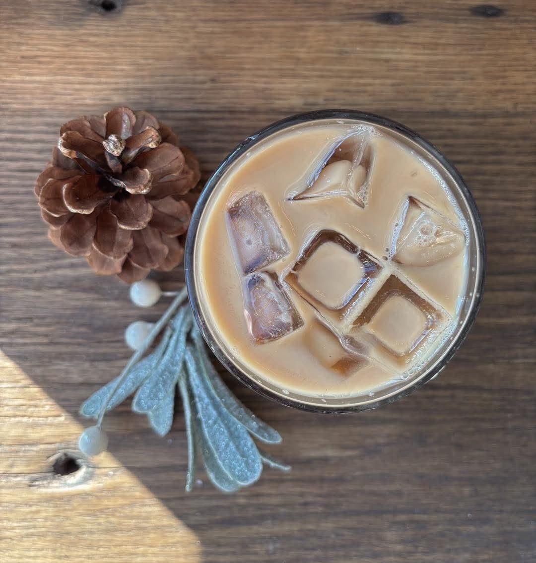 A shot from above of a brown iced drink