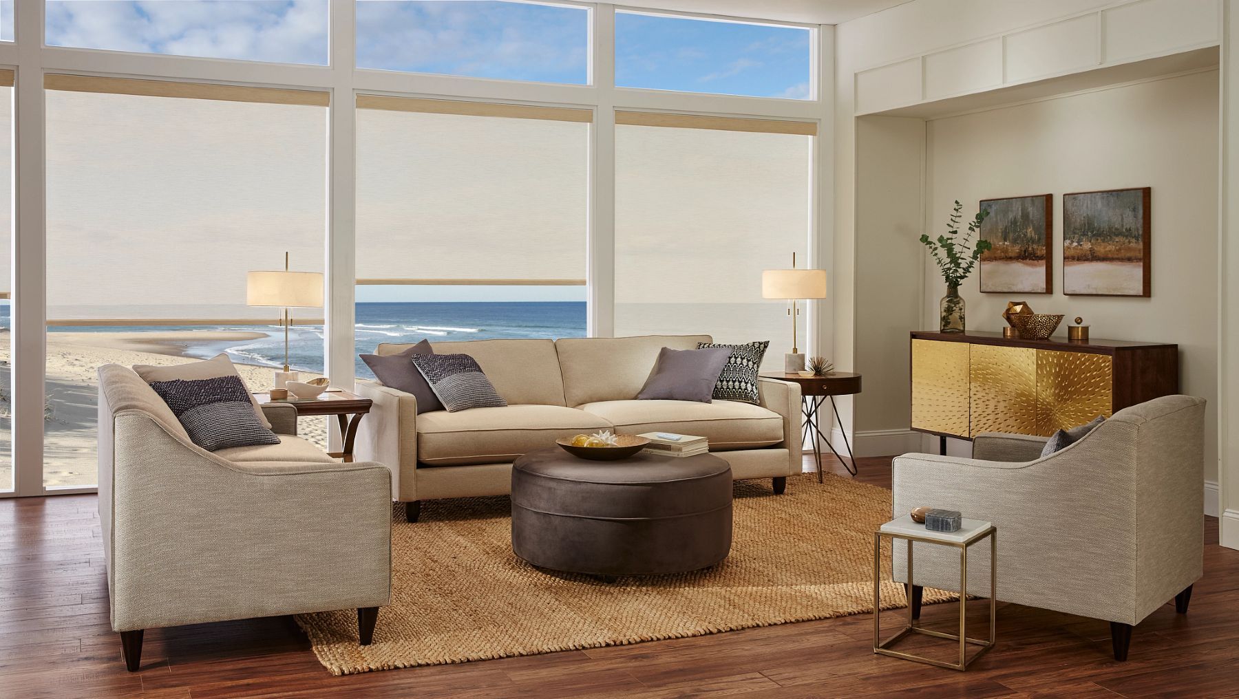 Solar motorized shades across wide windows, showing outdoor scenery and soft indoor lighting