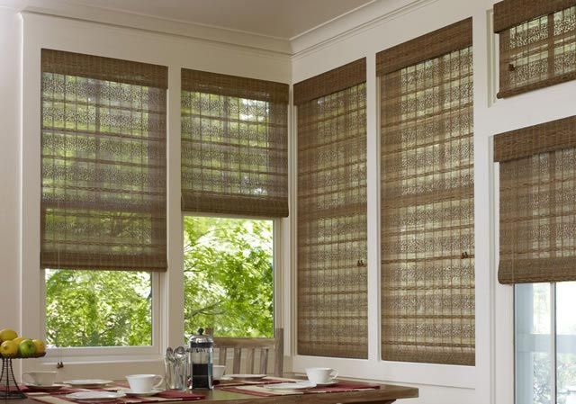 woven wood window shades installed in breakfast nook for natural light filtering and texture