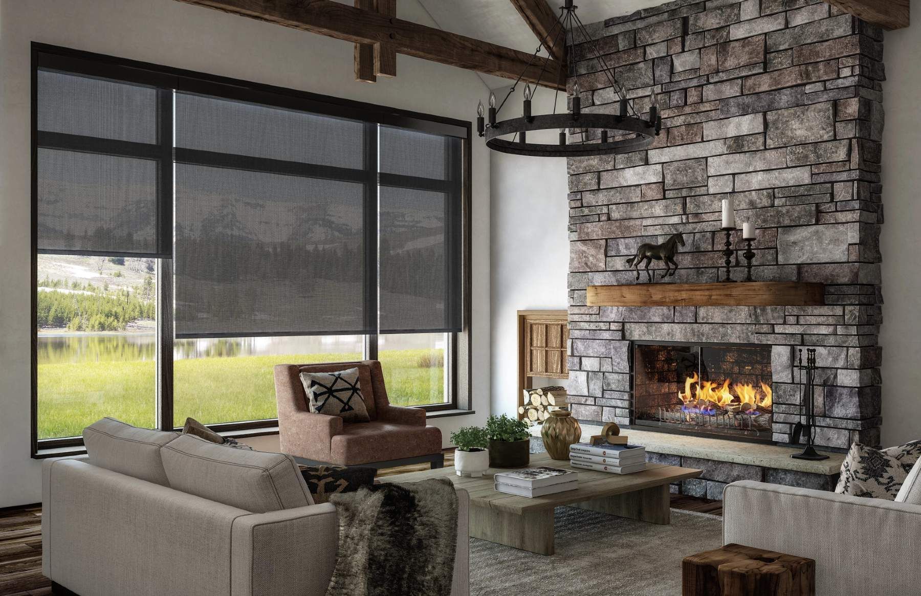 dark UV-blocking roller shades installed in rustic living room with stone fireplace
