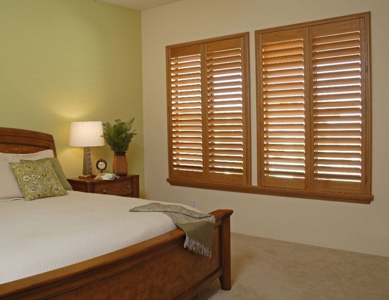 real wood plantation shutters installed in master bedroom in Colorado Springs