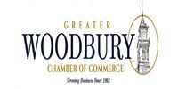 Greater Woodbury Chamber of Commerce logo with gold and navy text and a lighthouse icon