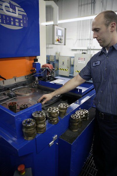 Man on grinding machine
