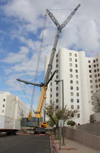 GMK7550 replacing HVAC equipment on top of Good Samaritan Hospital tower in Phoenix, AZ.
