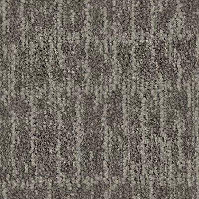 Close-up of gray and brown textured carpet pattern
