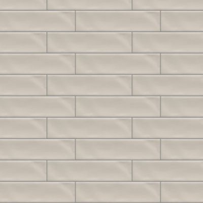Beige subway tile wall with a light gray grout pattern