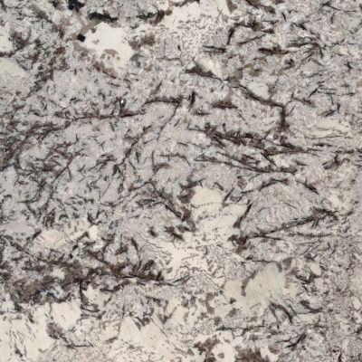 Close-up of a light gray and black marbled stone surface with veined texture
