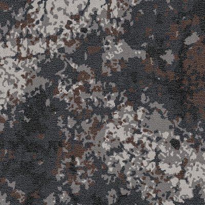 Abstract close-up of mottled gray, black, and brown camouflage-like texture