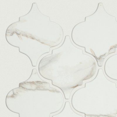 White marble-patterned decorative tiles with gray veining on a light background