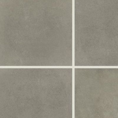 Gray tiled wall with white grout lines forming a cross pattern