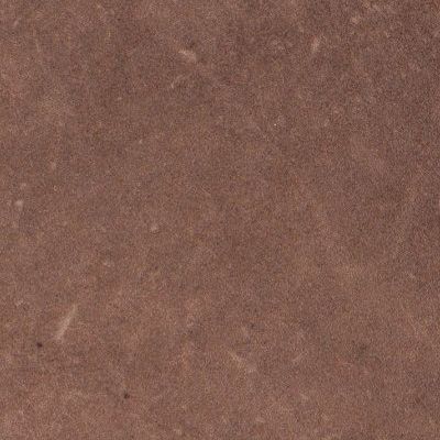 Close-up of a brown textured surface with subtle speckles and scratches