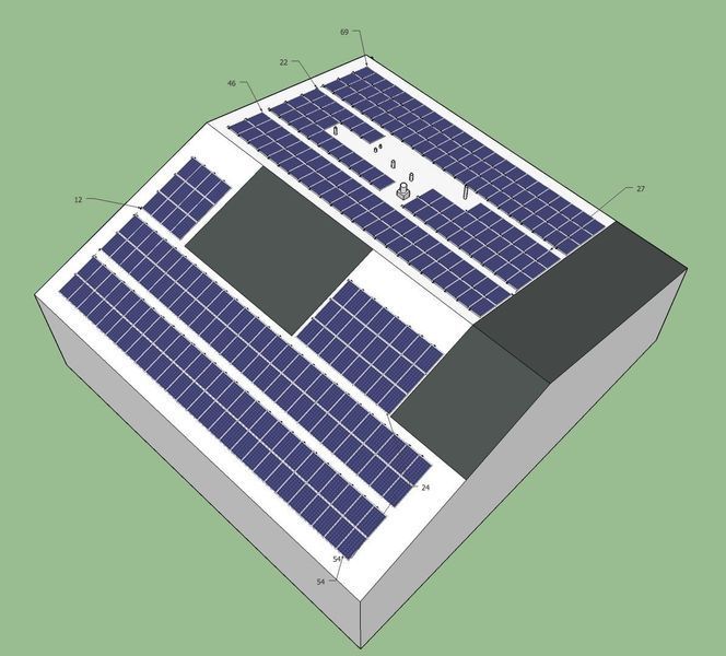 Solar panels installed on a white roof; angled view showing several rows of blue panels.