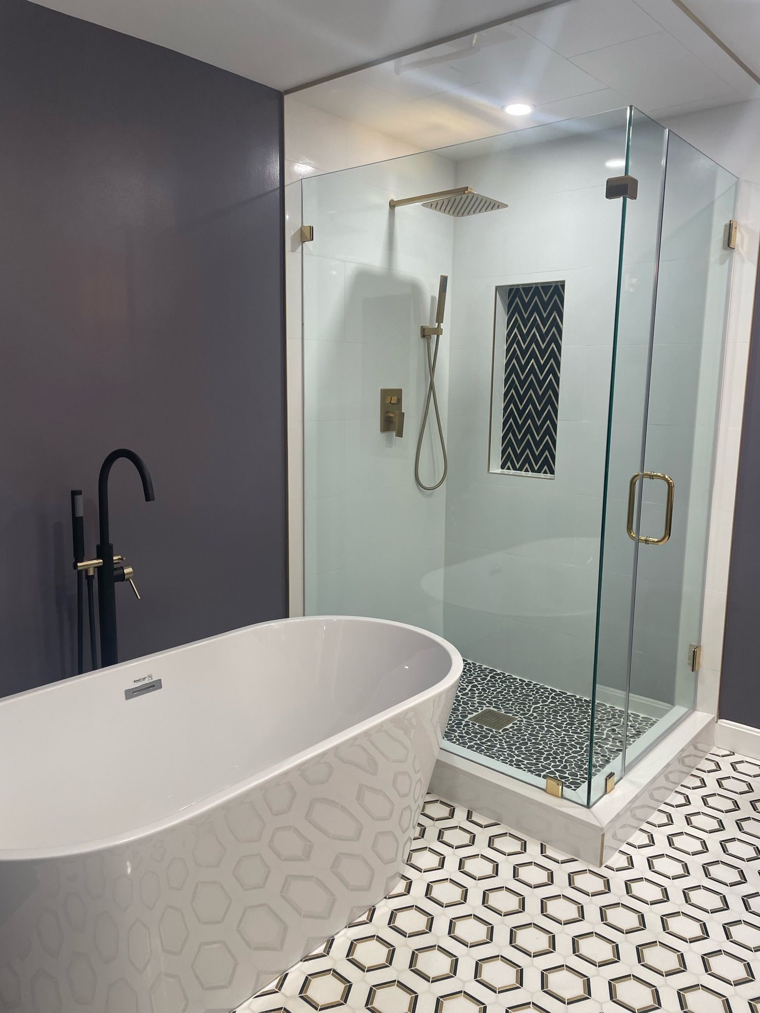 A white house with a car parked in front of it.