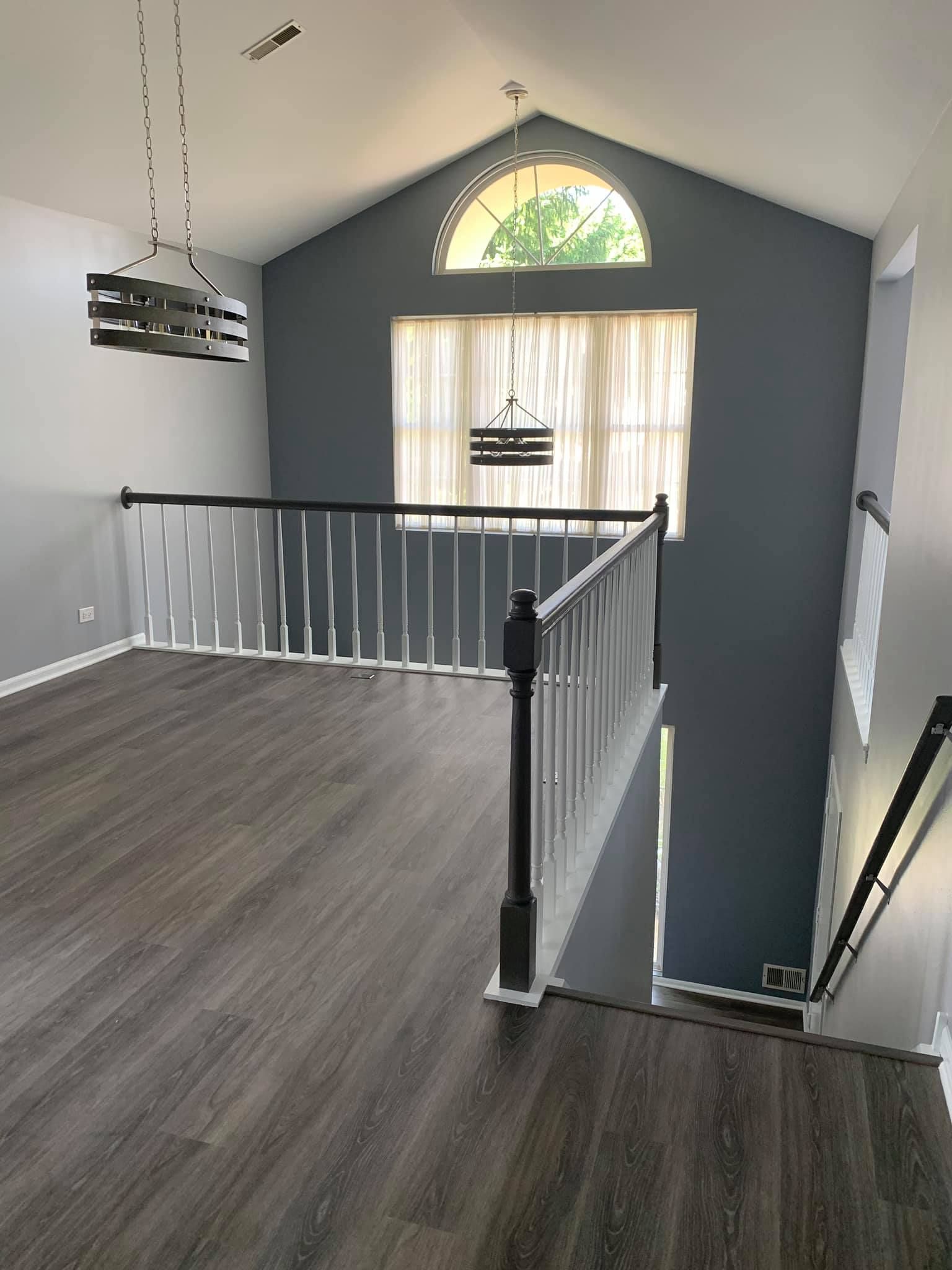 There is a staircase leading up to the second floor of a house.