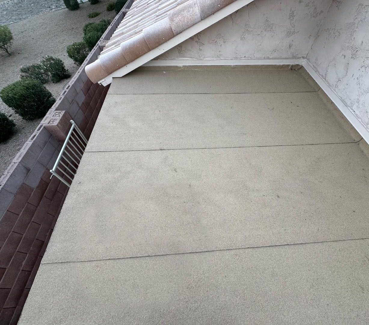 The roof of a building with a gutter on it