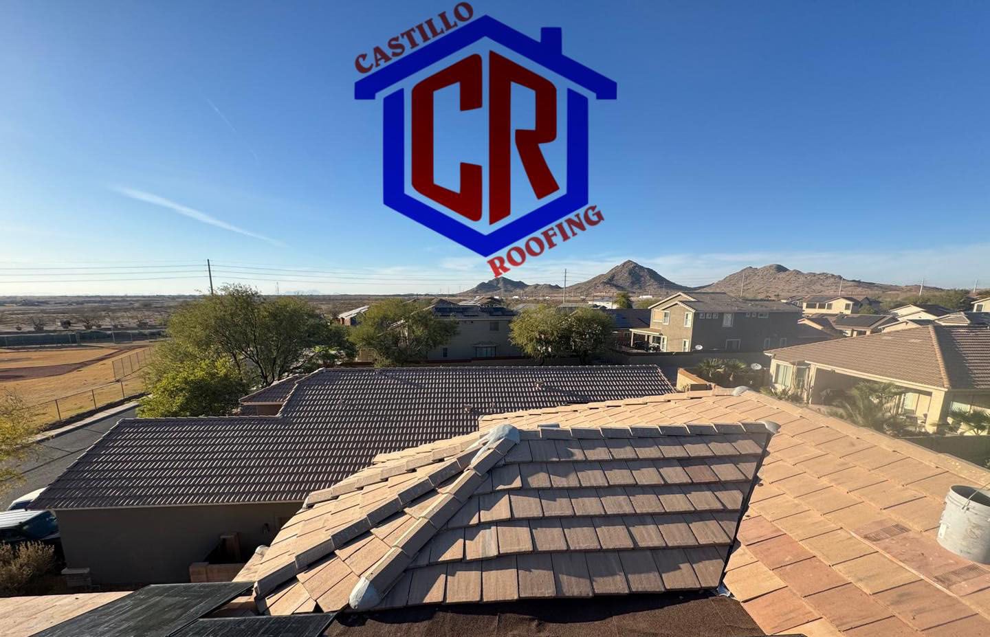 The roof of a house is being repaired by a company called castillo roofing.