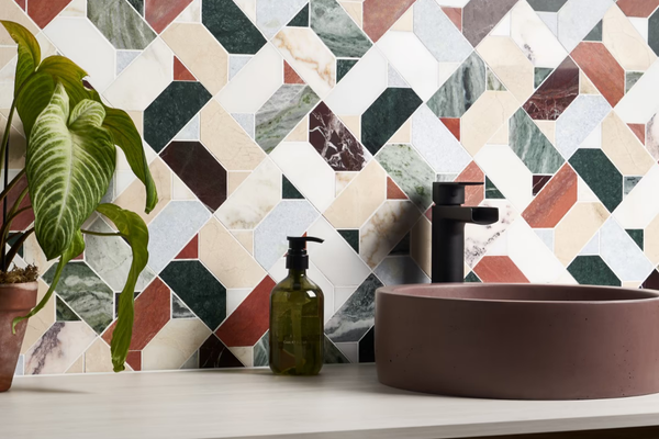 Learn More About Mosaics Tile showroom in Sarasota, FL with various mosaic tiles options made from glass, stone, or ceramic for shower floors, accent walls, backsplashes, swimming pools and spas.