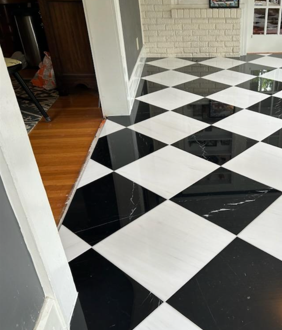 A black and white checkered floor in a living room