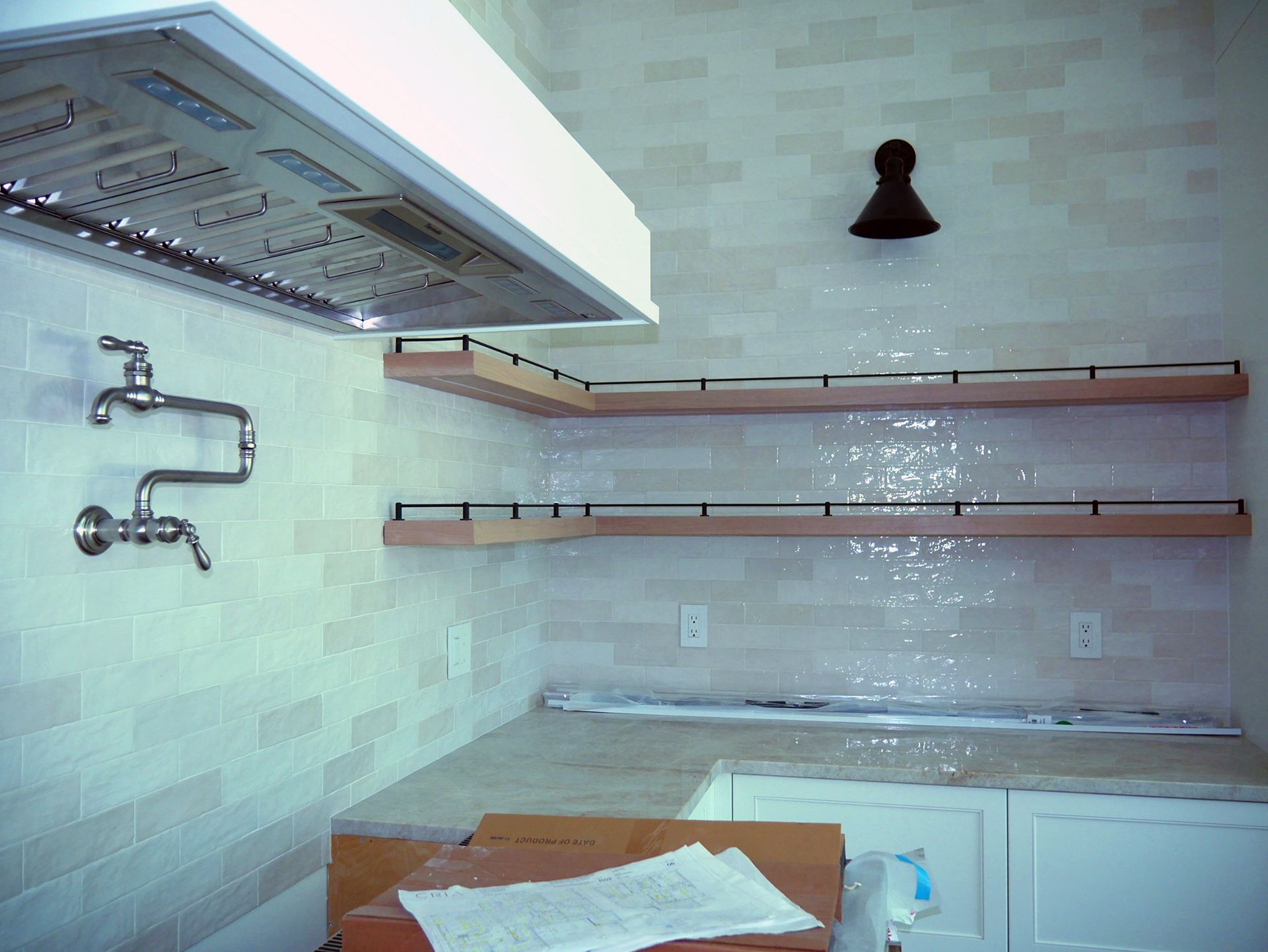A kitchen with shelves
