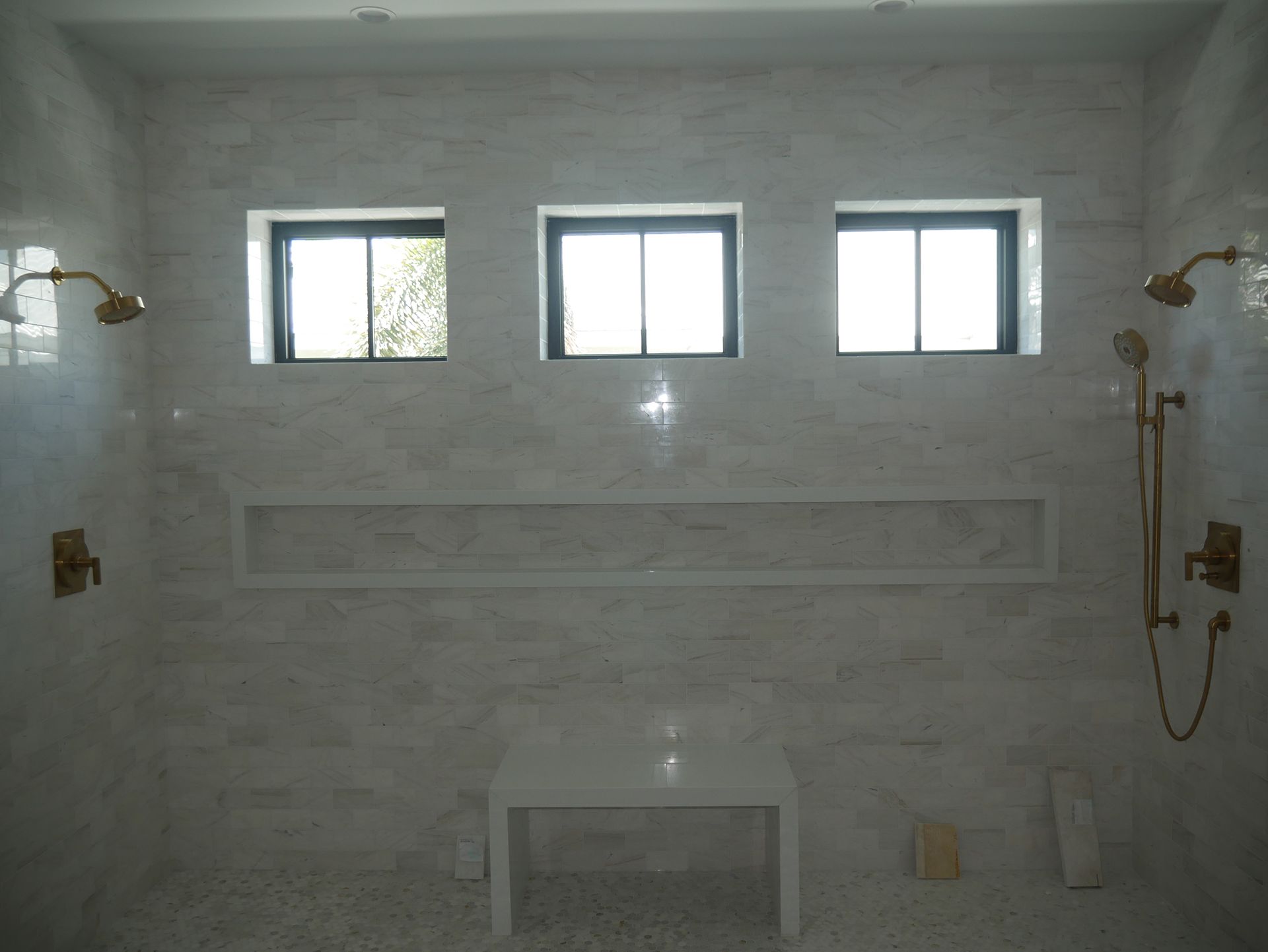 Bathroom with two shower heads