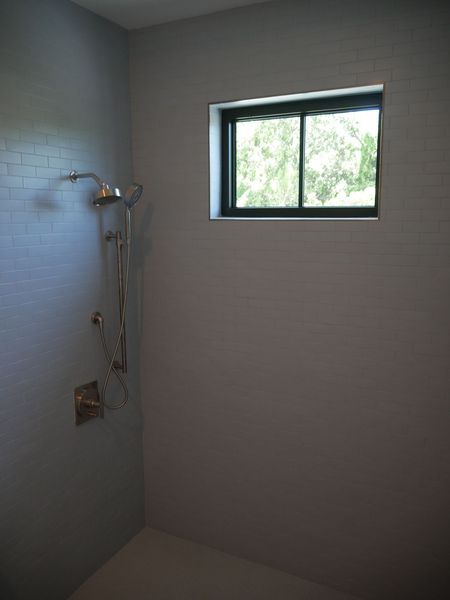 A shower with new wall tiles