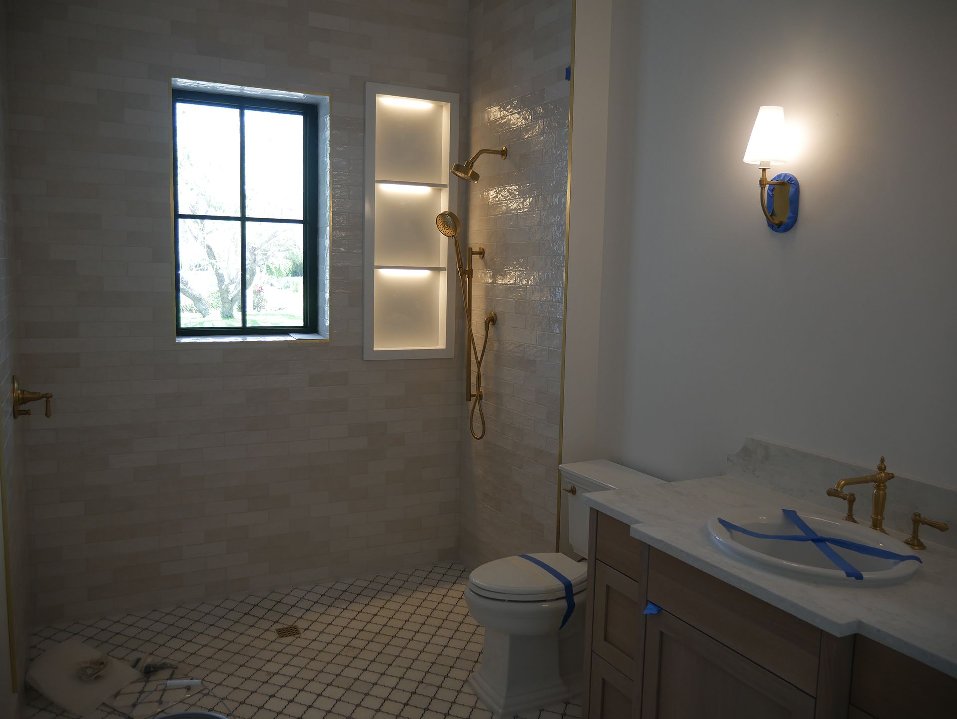 Bathroom with gold fixtures