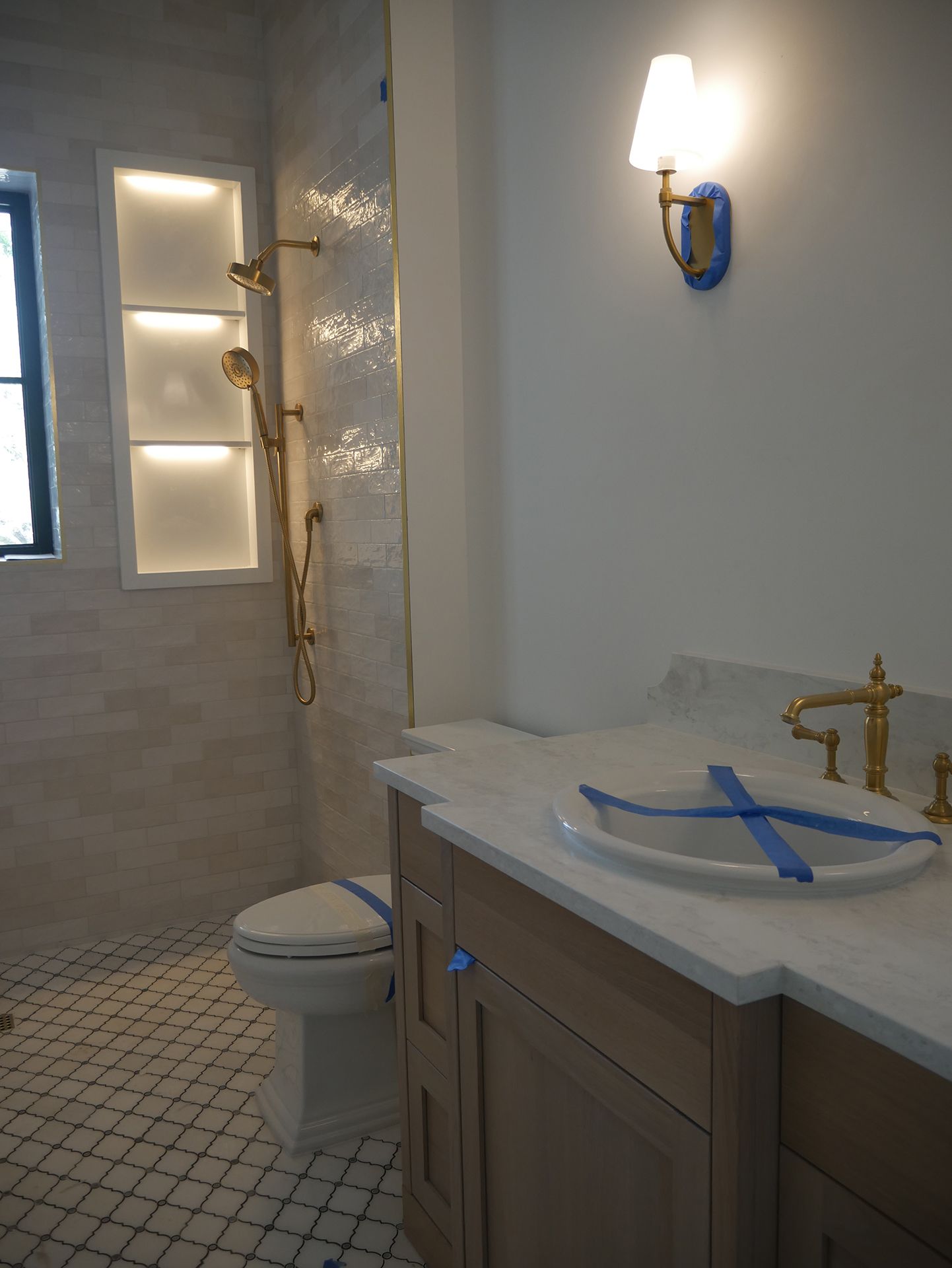 Bathroom with gold accents