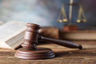 Gavel, books and scale of justice