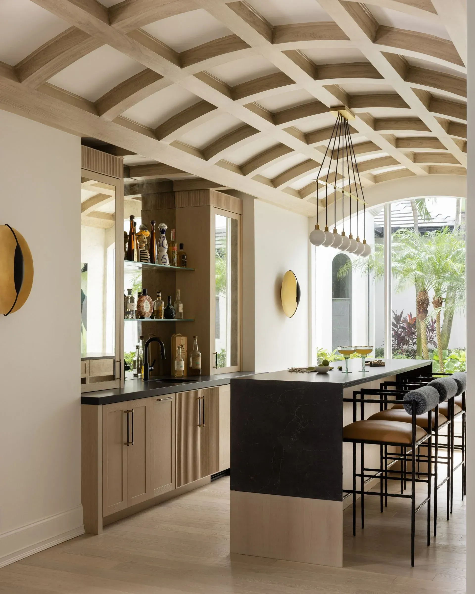 A wine room with a ceiling that has a grid pattern